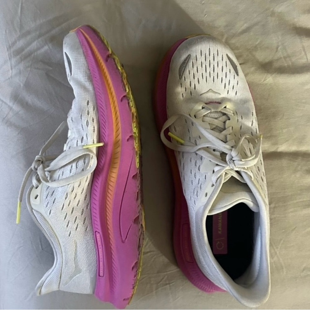 White and Pink Athletic Shoes